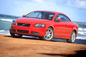 Sleek And Elegant Volvo C70 In Open Road Wallpaper