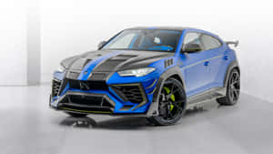 Sleek And Eye-catching Lamborghini Urus In Action Wallpaper