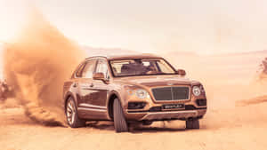 Sleek And Luxurious Bentley Bentayga In Motion Wallpaper