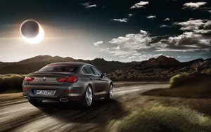 Sleek And Luxurious Bmw 6 Series In Action Wallpaper