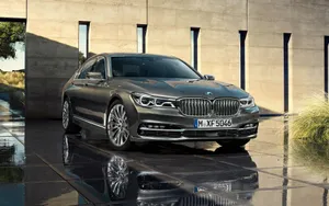 Sleek And Luxurious Bmw 7 Series In Motion Wallpaper
