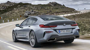 Sleek And Luxurious Bmw 8 Series In A Stunning Environment Wallpaper