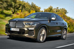 Sleek And Luxurious Bmw X6 Sports Activity Coupe Wallpaper