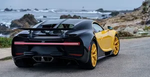 Sleek And Luxurious Bugatti Chiron In Action Wallpaper