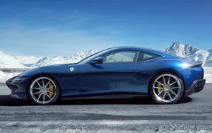 Sleek And Luxurious Ferrari Roma Cruising The Streets Wallpaper
