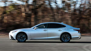 Sleek And Luxurious Lexus Ls 500 In Motion Wallpaper