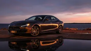 Sleek And Luxurious Maserati Ghibli In Action Wallpaper