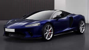 Sleek And Luxurious Mclaren Gt On The Open Road Wallpaper