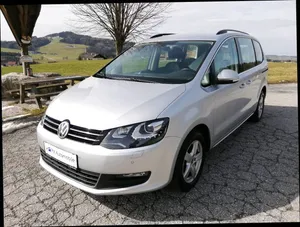 Sleek And Luxurious Volkswagen Sharan In Movement Wallpaper