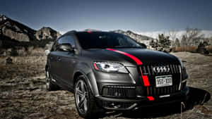 Sleek And Modern Audi Q7 In Action Wallpaper