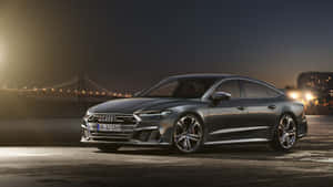 Sleek And Modern Audi S7 On The Road Wallpaper