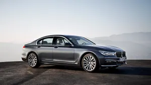 Sleek And Modern Bmw 7 Series In Motion Wallpaper