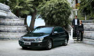 Sleek And Modern Byd Electric Vehicle On The Road Wallpaper