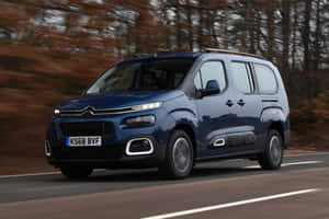 Sleek And Modern Citroen Berlingo On The Move Wallpaper