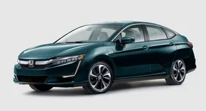 Sleek And Modern Honda Clarity On Scenic Road Wallpaper