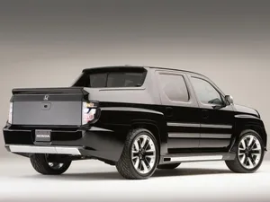Sleek And Modern Honda Ridgeline On The Road Wallpaper
