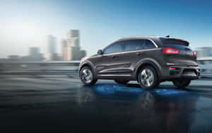 Sleek And Modern Kia Niro On The Road Wallpaper