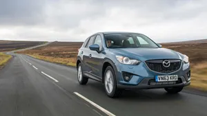 Sleek And Modern Mazda Cx-5 On The Road Wallpaper