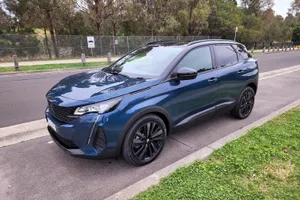 Sleek And Modern Peugeot 3008 On Open Road Wallpaper