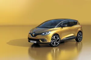 Sleek And Modern Renault Scenic Cruise On The Road Wallpaper