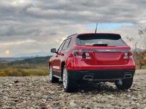 Sleek And Modern Saab 9-4x In Motion Wallpaper