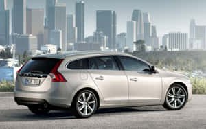 Sleek And Modern Volvo V60 On An Open Road Wallpaper