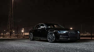 Sleek And Powerful Audi S4 In Action Wallpaper