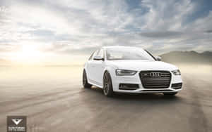 Sleek And Powerful Audi S4 In Action Wallpaper