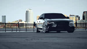 Sleek And Powerful Audi S8 In Motion Wallpaper