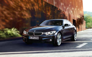 Sleek And Powerful Bmw 4 Series In Action Wallpaper