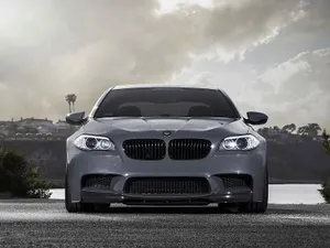 Sleek And Powerful Bmw M5 In Action Wallpaper