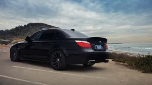 Sleek And Powerful Bmw M5 In Action Wallpaper