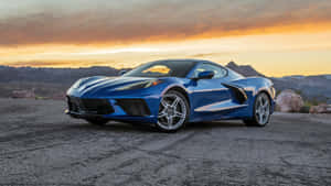 Sleek And Powerful Chevrolet Corvette Stingray In Action Wallpaper