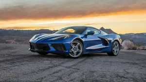 Sleek And Powerful Chevrolet Corvette Stingray In Action Wallpaper