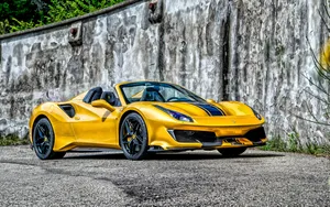 Sleek And Powerful Ferrari 488 Spider In Action Wallpaper