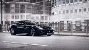 Sleek And Powerful Ferrari Ff On The Road Wallpaper