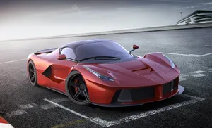 Sleek And Powerful Ferrari Laferrari On The Road Wallpaper