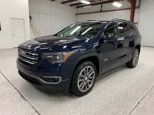Sleek And Powerful Gmc Acadia In Action Wallpaper