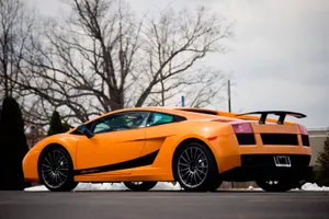 Sleek And Powerful Lamborghini Gallardo On The Road Wallpaper