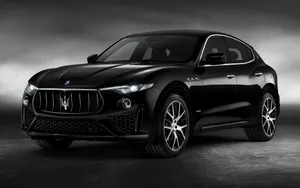 Sleek And Powerful Maserati Levante In Motion Wallpaper