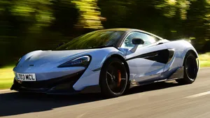 Sleek And Powerful Mclaren 600lt In Action Wallpaper