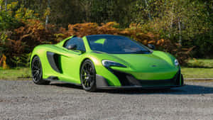 Sleek And Powerful Mclaren 675lt Spider In Action Wallpaper