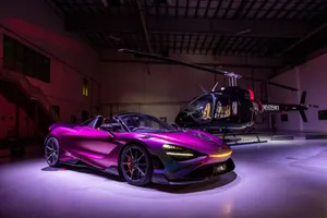 Sleek And Powerful Mclaren 765lt On The Open Road Wallpaper