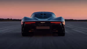 Sleek And Powerful Mclaren Speedtail On The Road Wallpaper