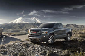 Sleek And Rugged Gmc Canyon In Natural Scenery Wallpaper