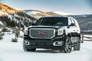 Sleek And Rugged Gmc Yukon At Dusk Wallpaper