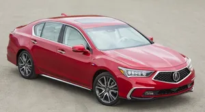 Sleek And Sophisticated Acura Rlx In The City Wallpaper