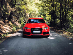 Sleek And Sophisticated Audi A3 Showcased Under Dramatic Lighting. Wallpaper
