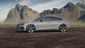 Sleek And Sophisticated Audi A5 In Action Wallpaper