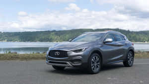 Sleek And Sophisticated Infiniti Qx30 In Outdoor Setting Wallpaper